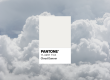 Cloud Dancer Pantone swatch on a cloud background
