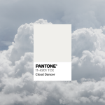 Cloud Dancer Pantone swatch on a cloud background